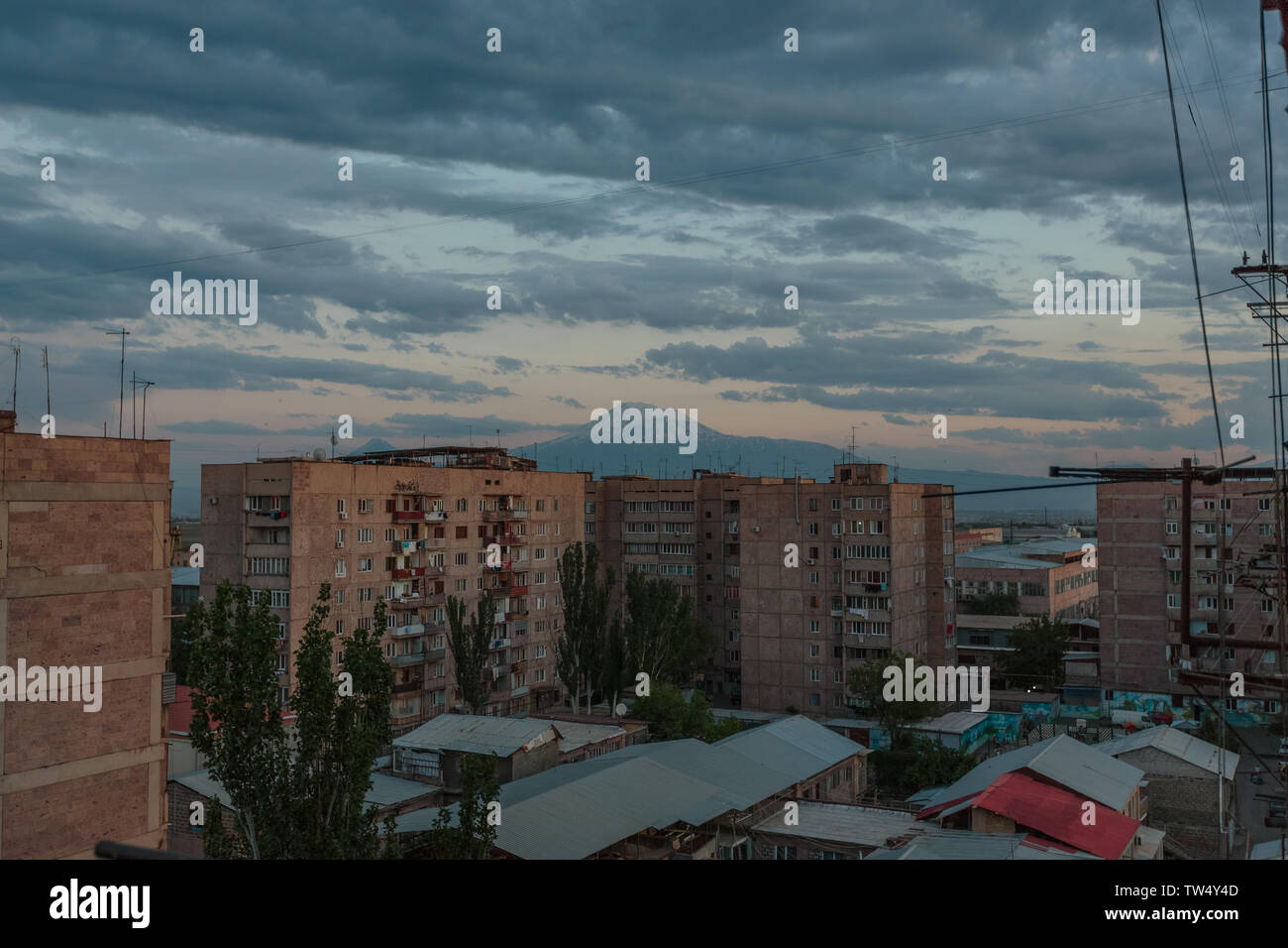 multi storey houses against the blue sky and white clouds Stock Photo ...