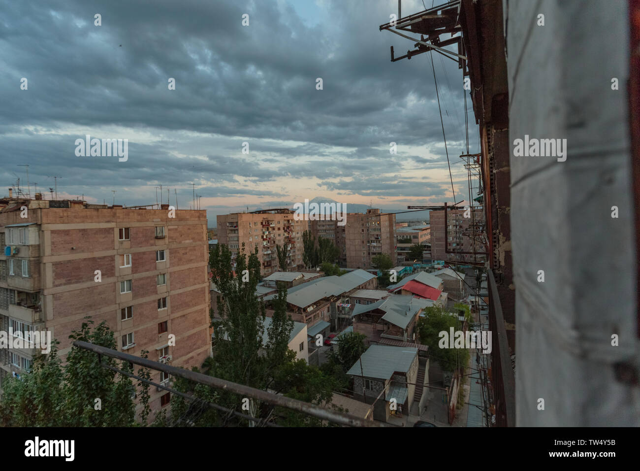 multi storey houses against the blue sky and white clouds Stock Photo ...