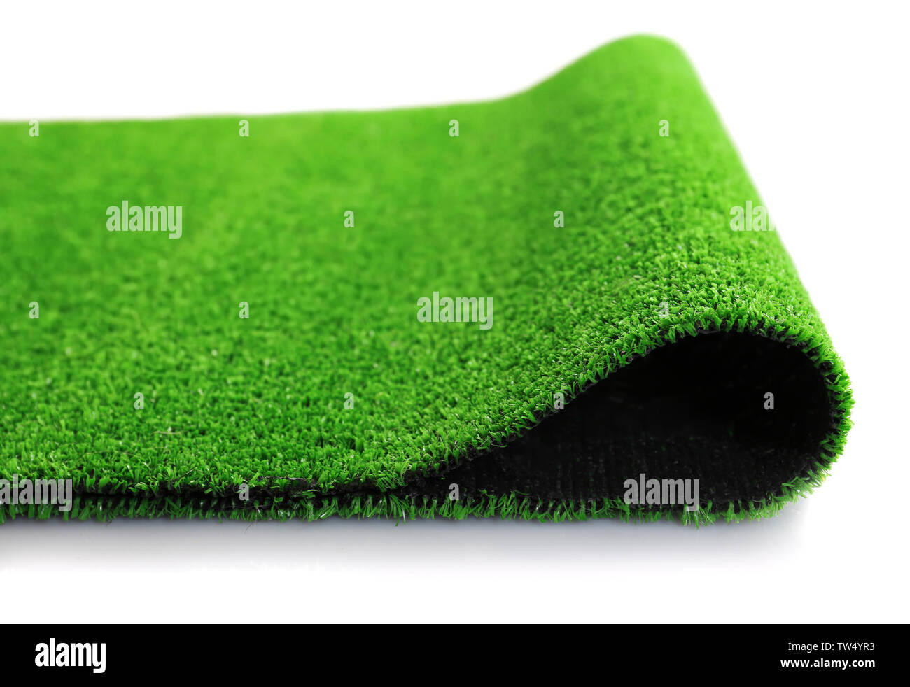 Artificial grass mat on white background Stock Photo