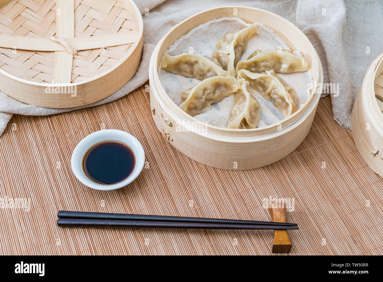 A cage of traditional Chinese food steamed dumplings Stock Photo Alamy