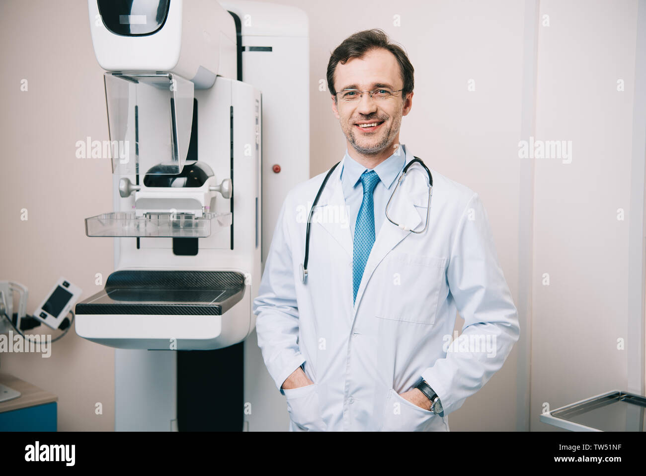 Radiologist looking to camera hi-res stock photography and images - Alamy