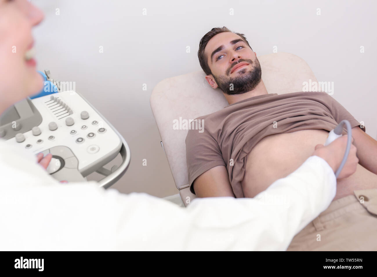Ultrasonography man hi-res stock photography and images - Alamy