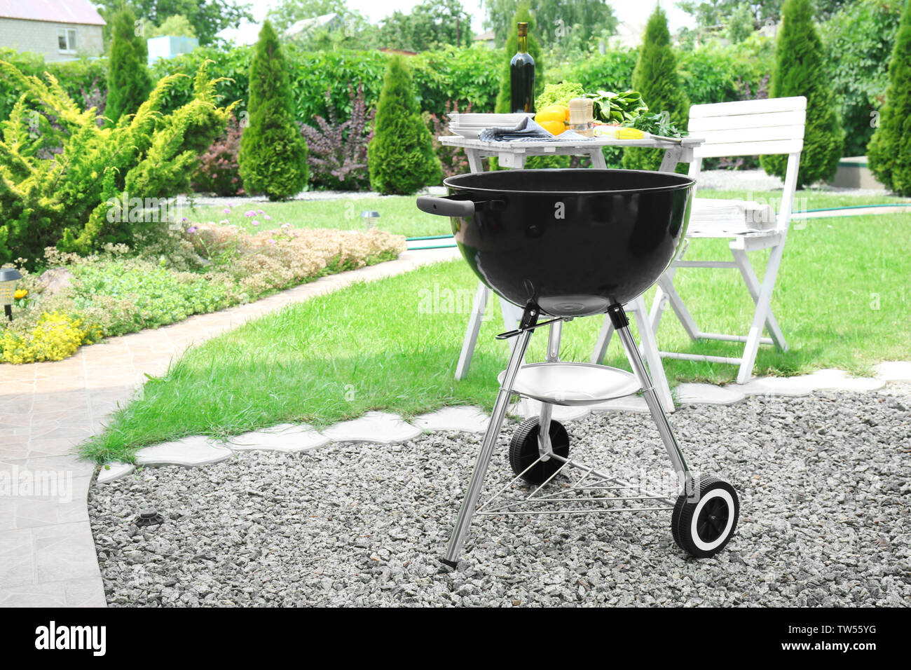 Barbecue grill with firewood outdoors Stock Photo Alamy