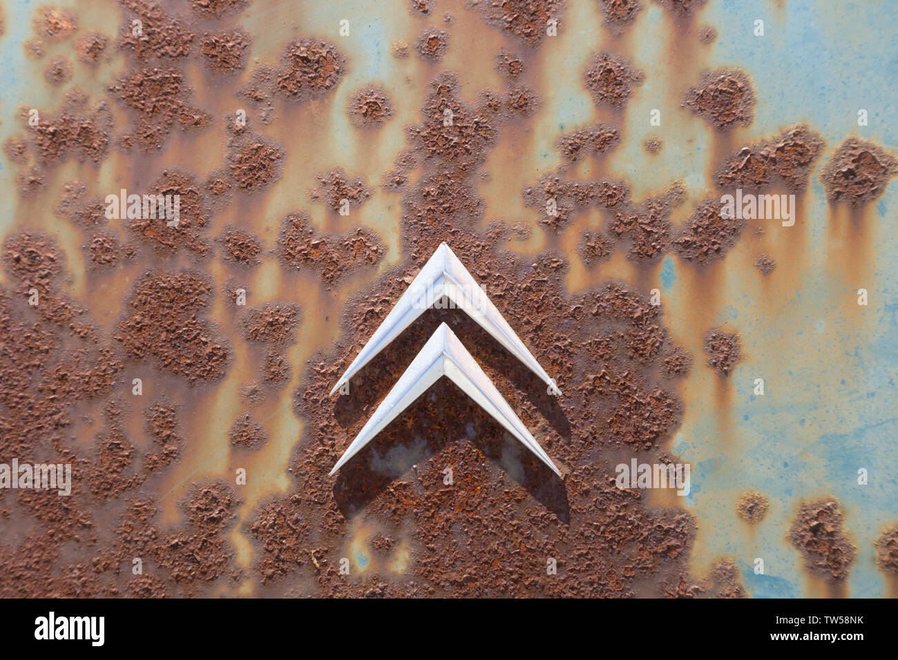 Citroen car chevrons on a bonnet with rusty paint Stock Photo