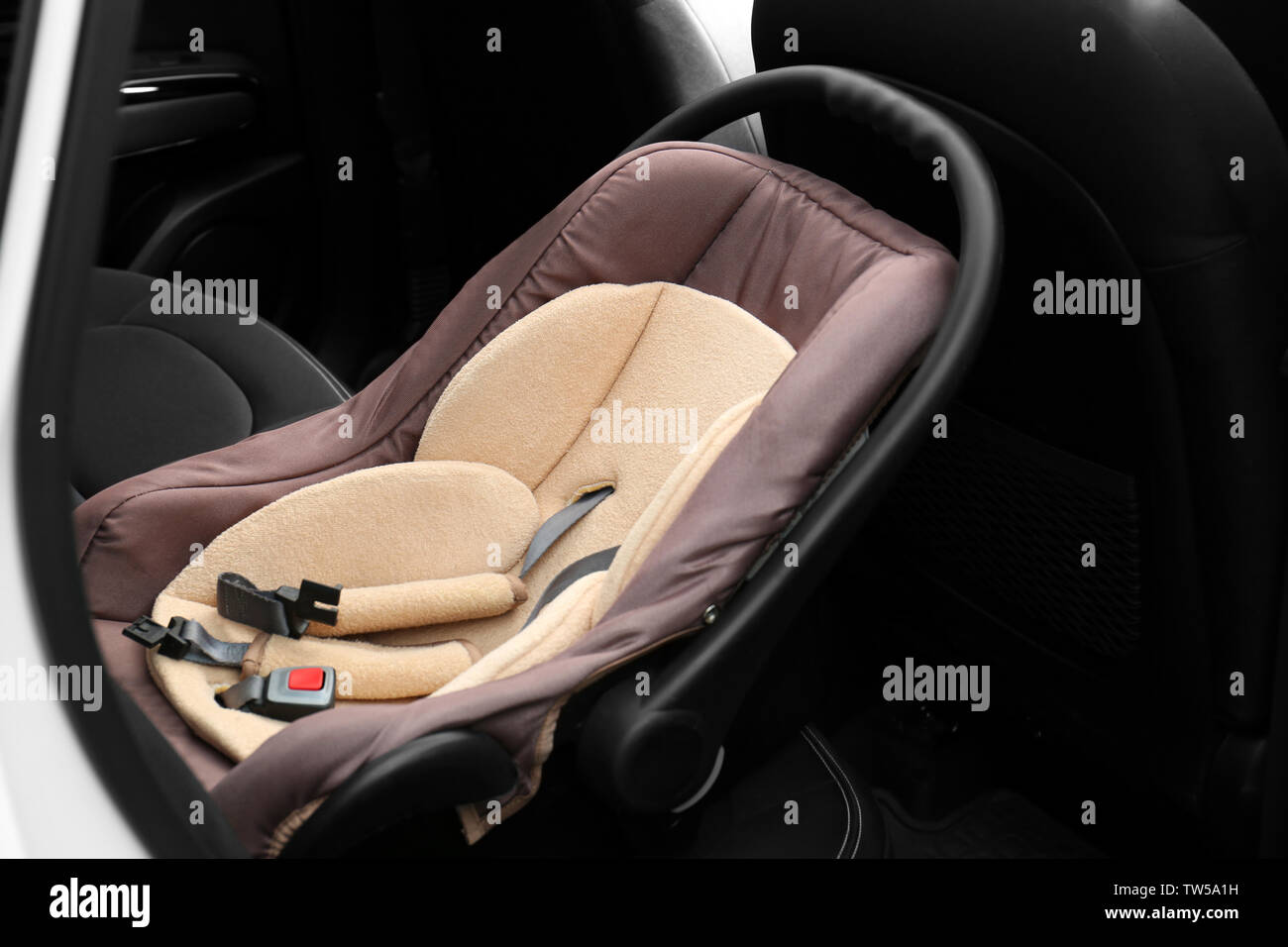 Empty child safety seat in car Stock Photo Alamy