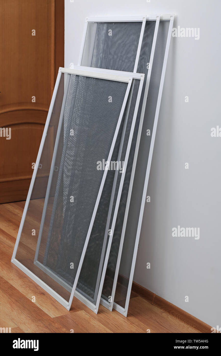 Mosquito window screens indoors Stock Photo Alamy