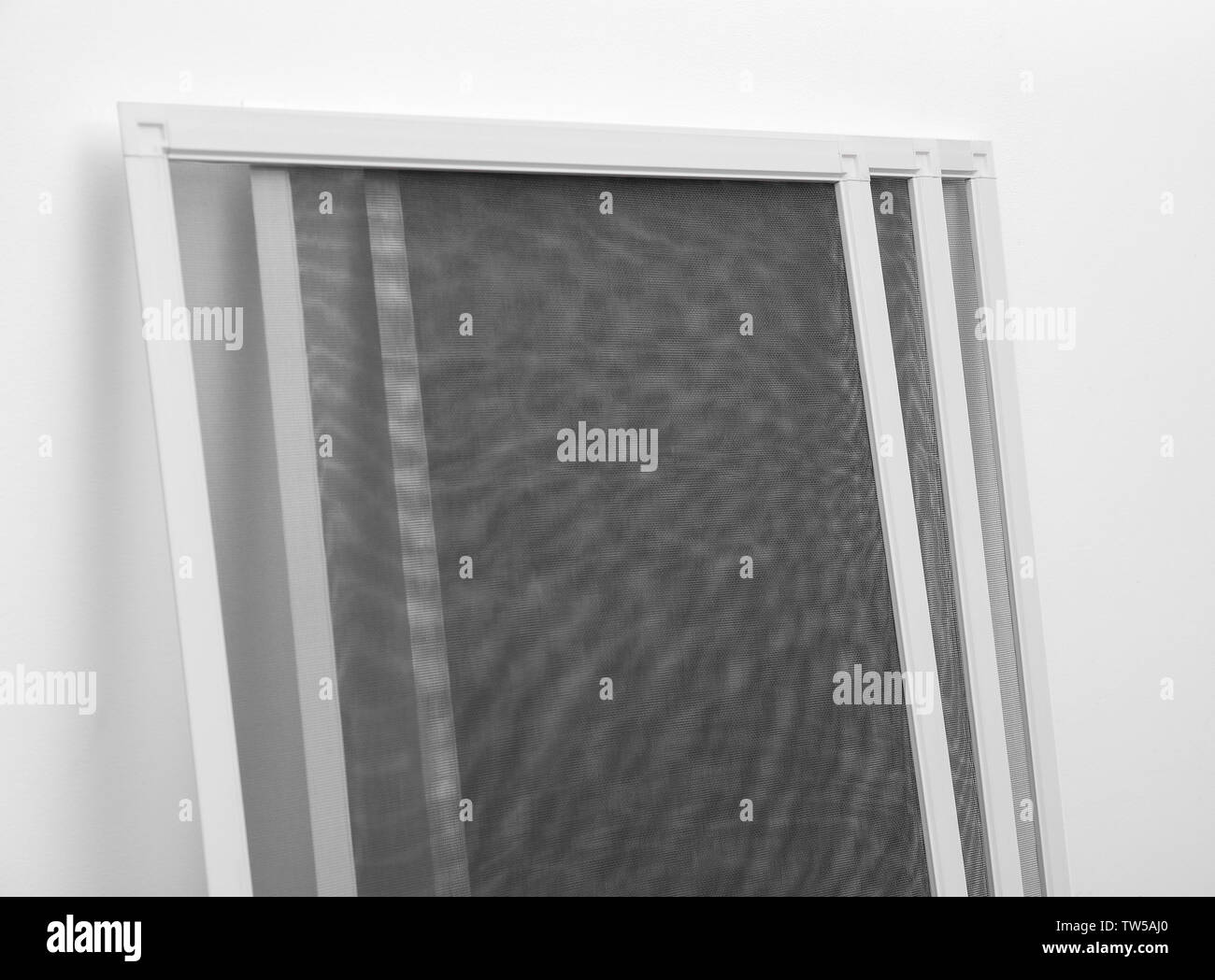 New mosquito window screens on white background Stock Photo Alamy