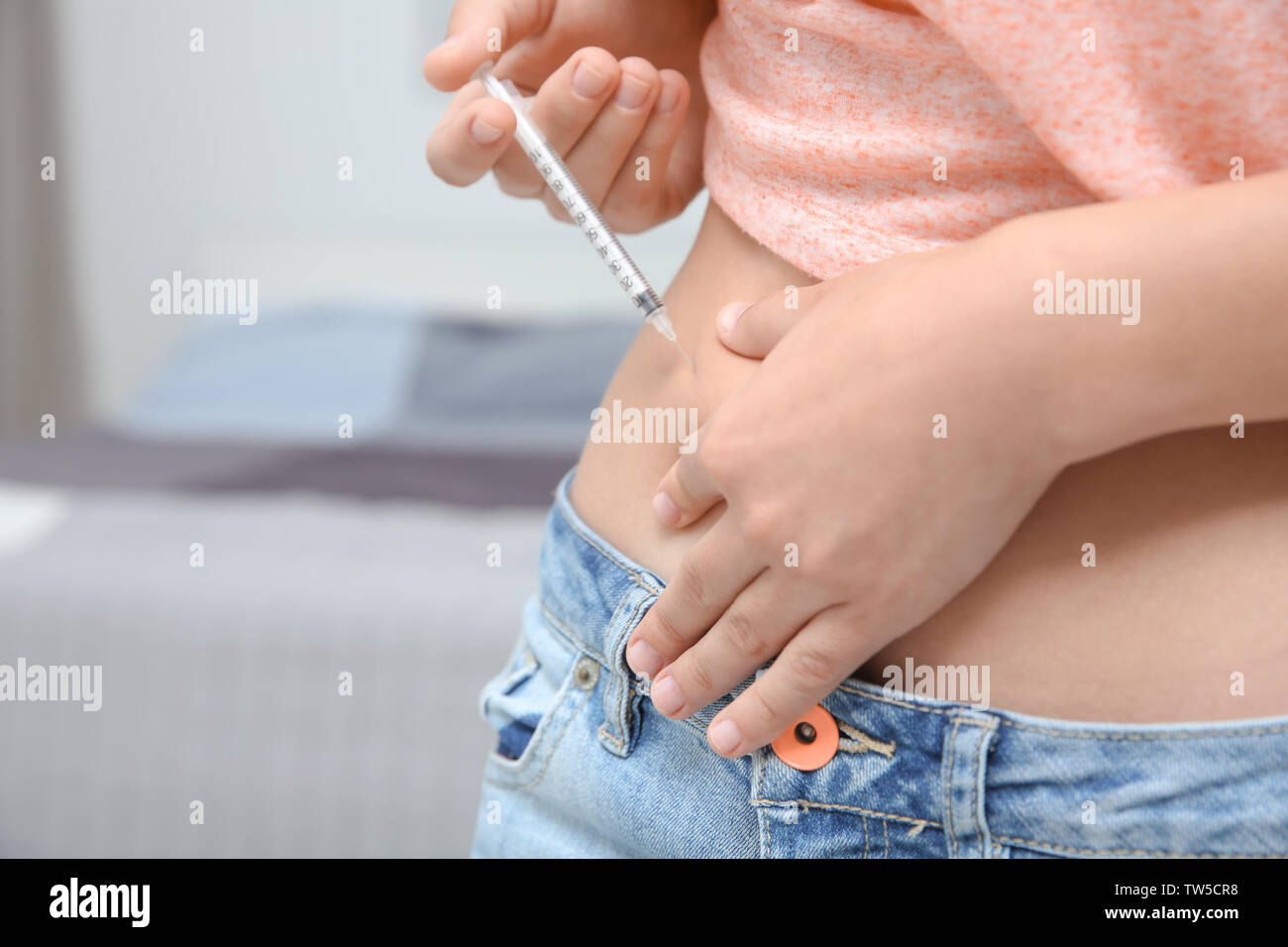 Diabetic patient injecting insulin in stomach, closeup Stock Photo Alamy