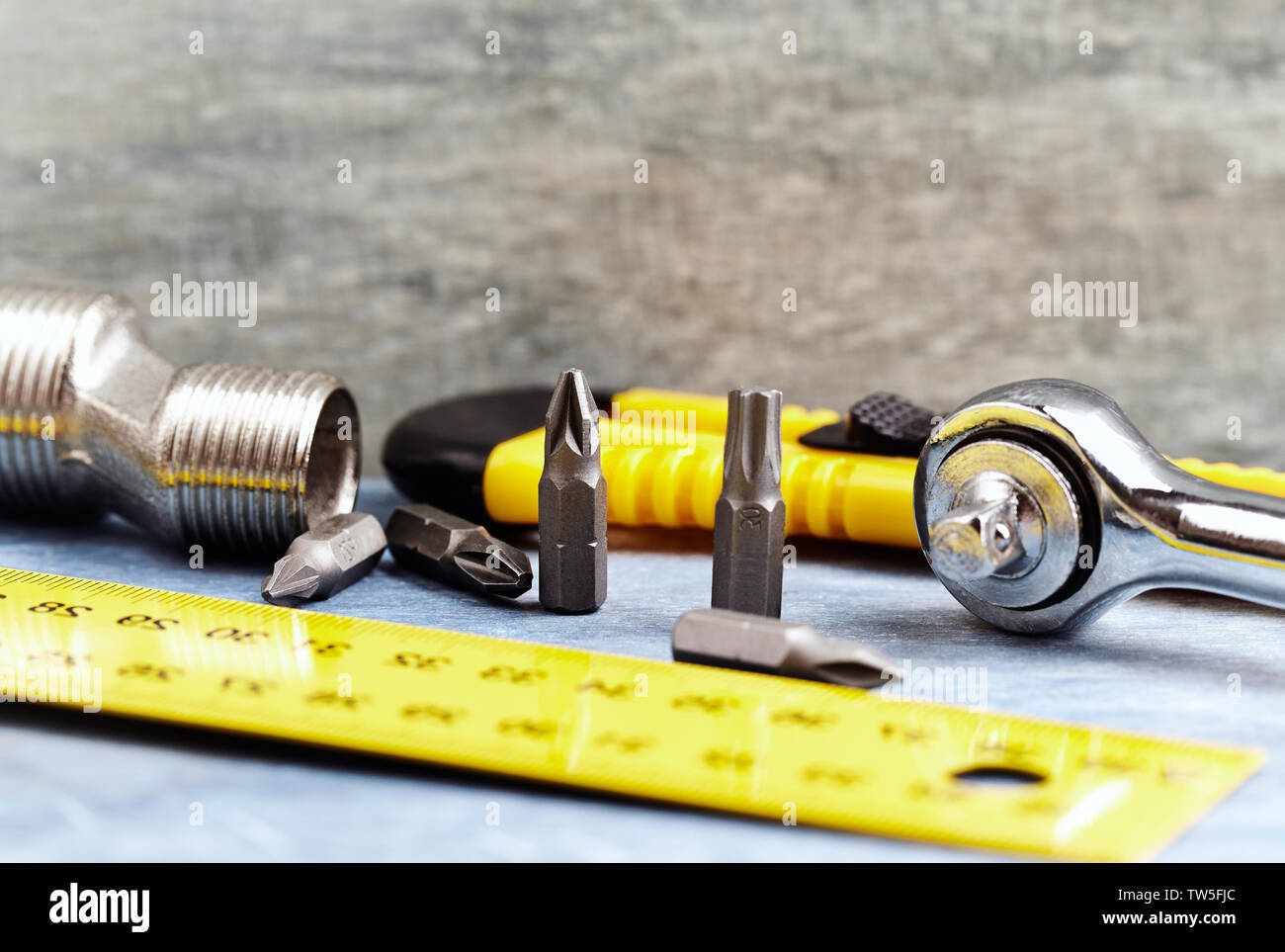 Hand tools on a wooden background. Close up. Stock Photo