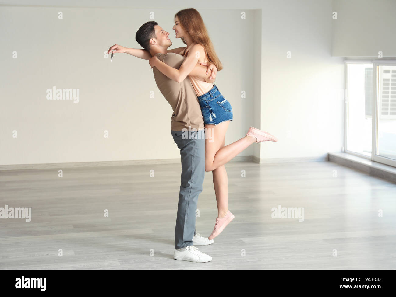 Young woman dancing in empty hi-res stock photography and images - Alamy