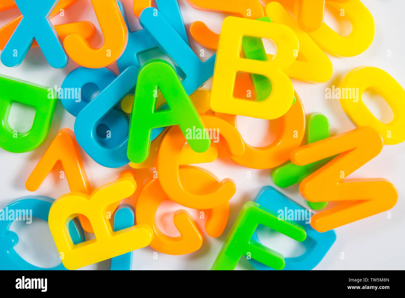 colorful letters stacked in a row Stock Photo - Alamy