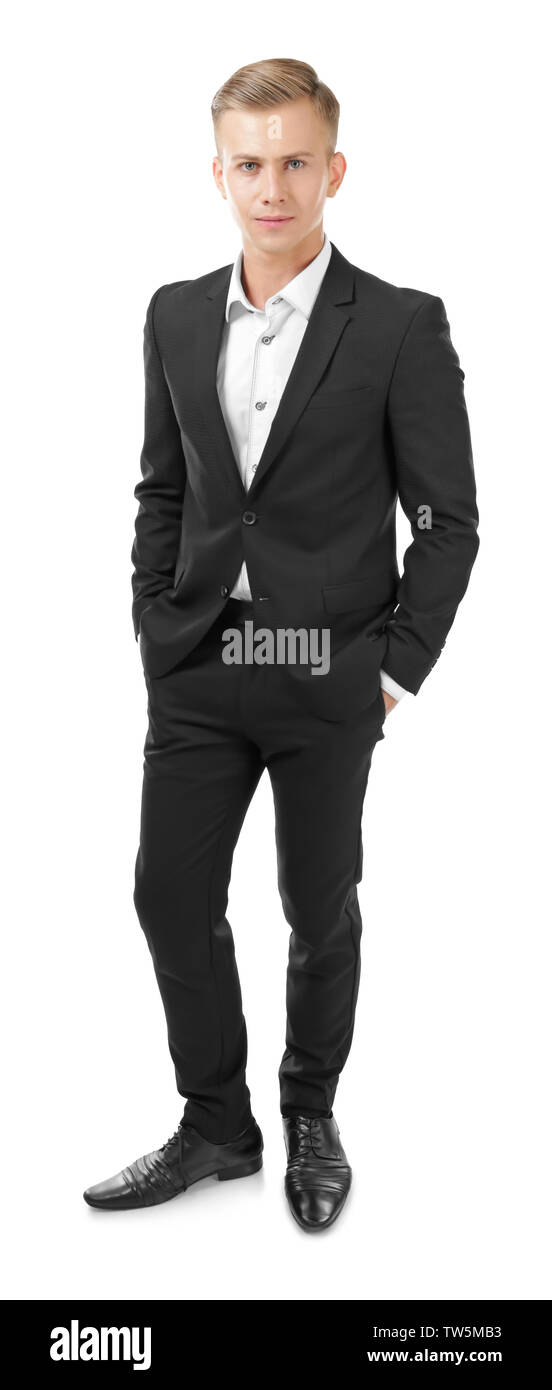 Young man in black suit on white background Stock Photo - Alamy