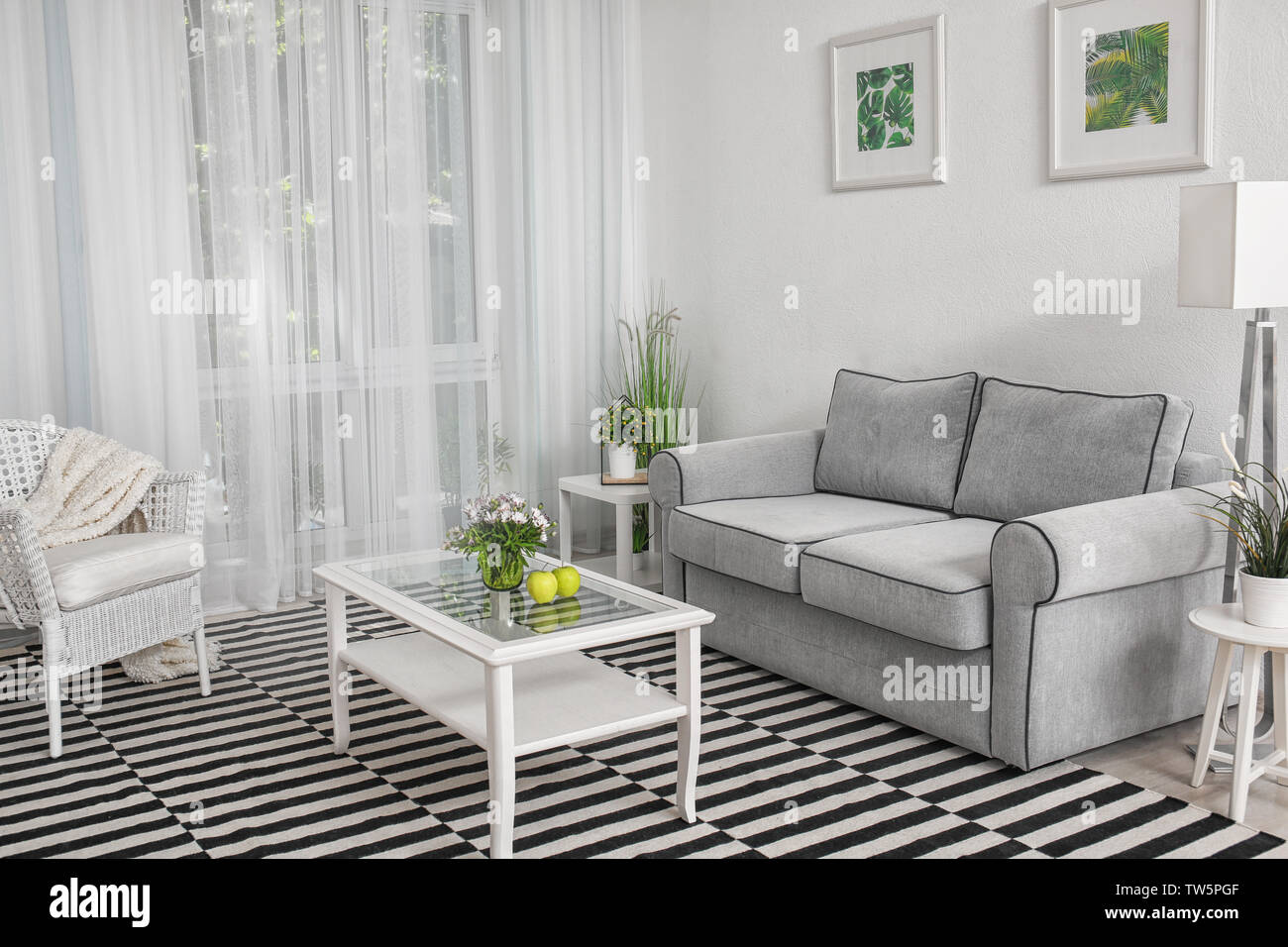 Modern living room design with big striped carpet Stock Photo Alamy