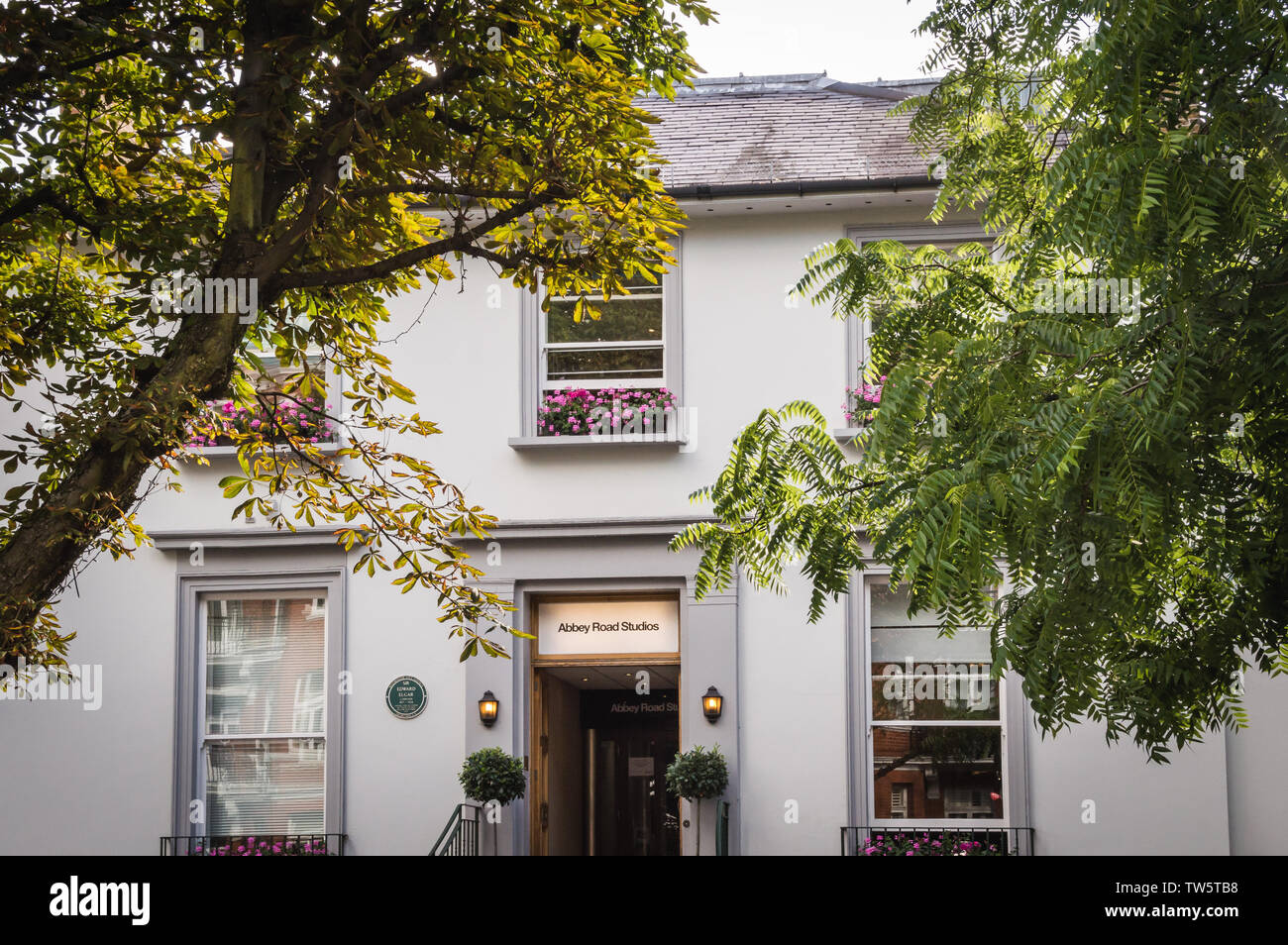 London - July 8th 2014: Abbey Road Studios facade surrounded by vegetation Stock Photo