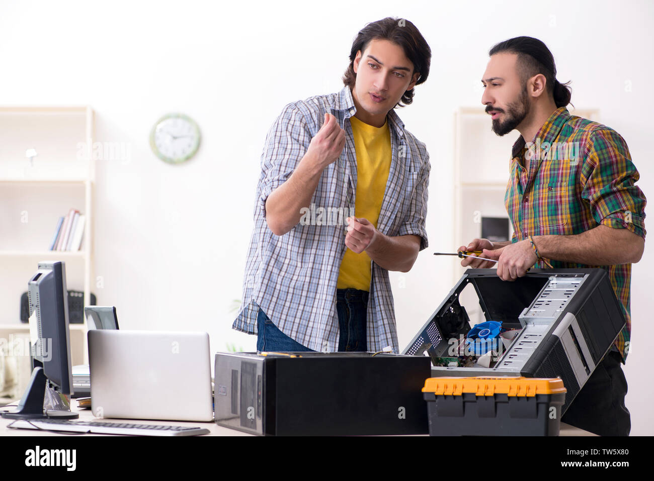 IT engineers working on hardware issue Stock Photo