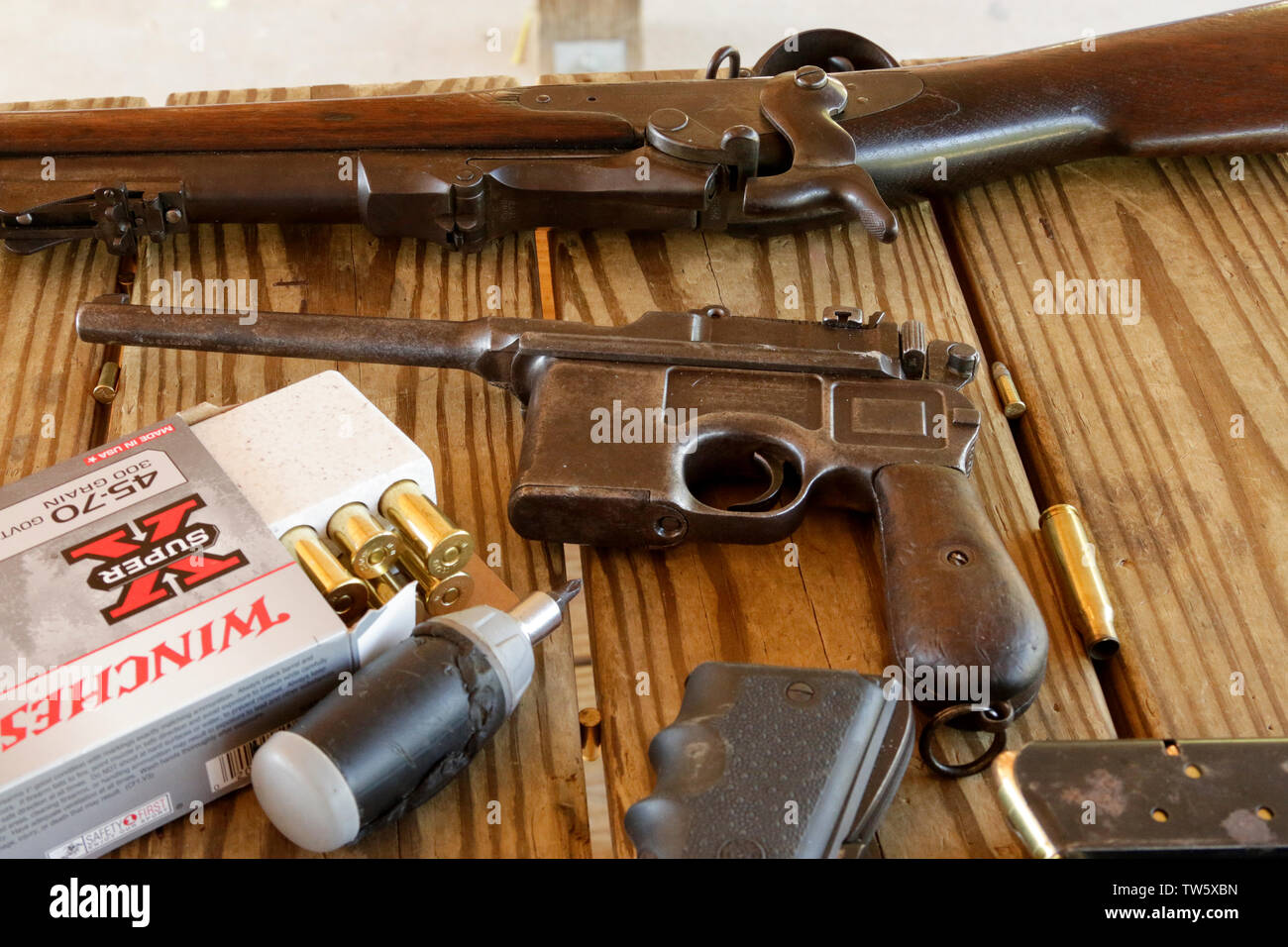 Mauser C96 Handgun and 45-70 Model 1873 Trapdoor Rifle Stock Photo