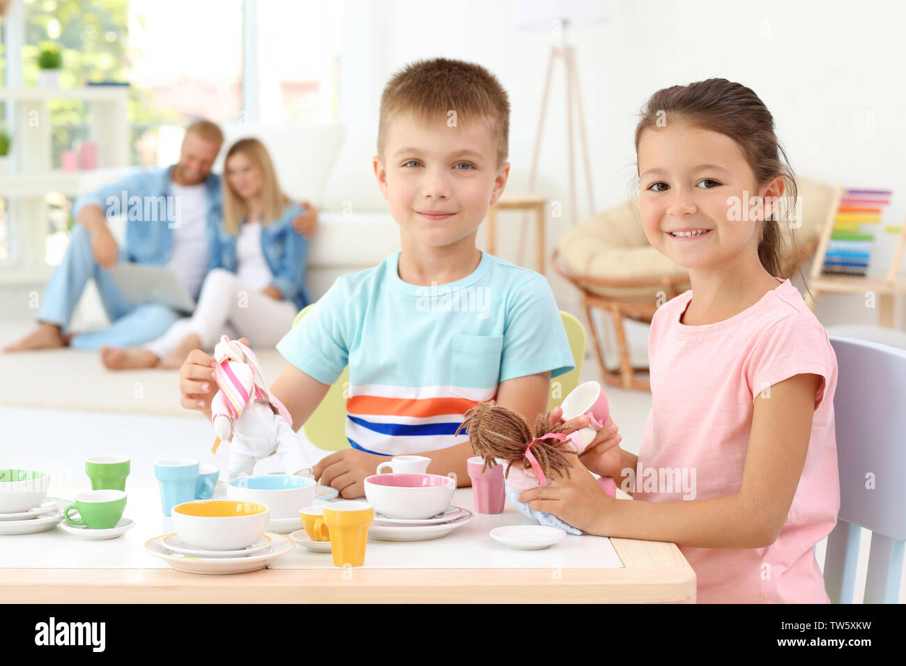 Boy girl playing tea party hi-res stock photography and images - Alamy