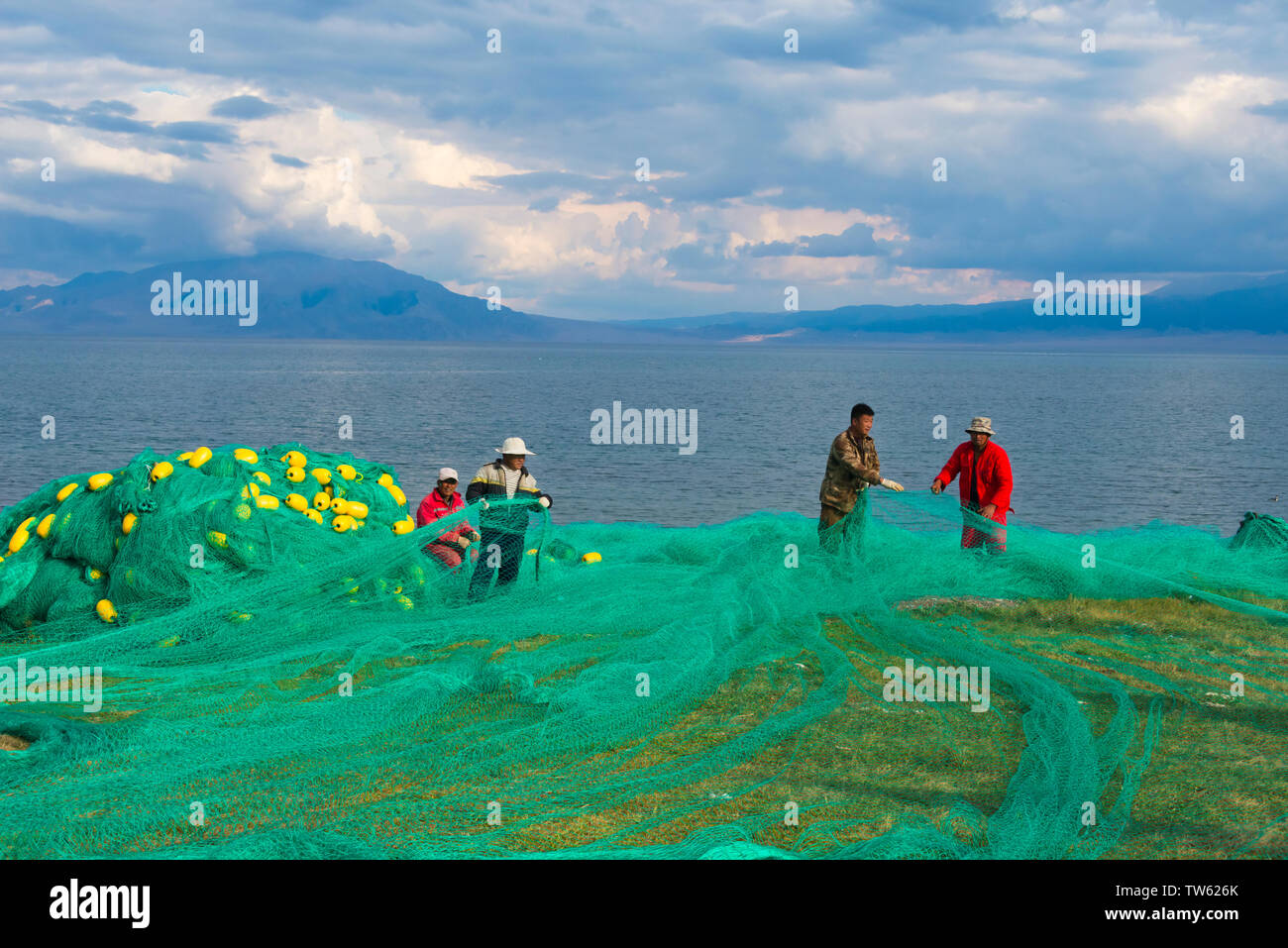 Fishing on the shore of Sayram Lake, Yining (Ghulja), Xinjiang Province, China Stock Photo
