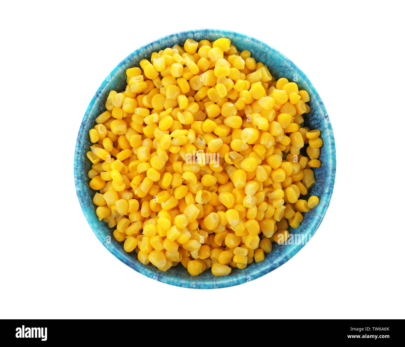 Bowl with canned corn kernels on white background Stock Photo