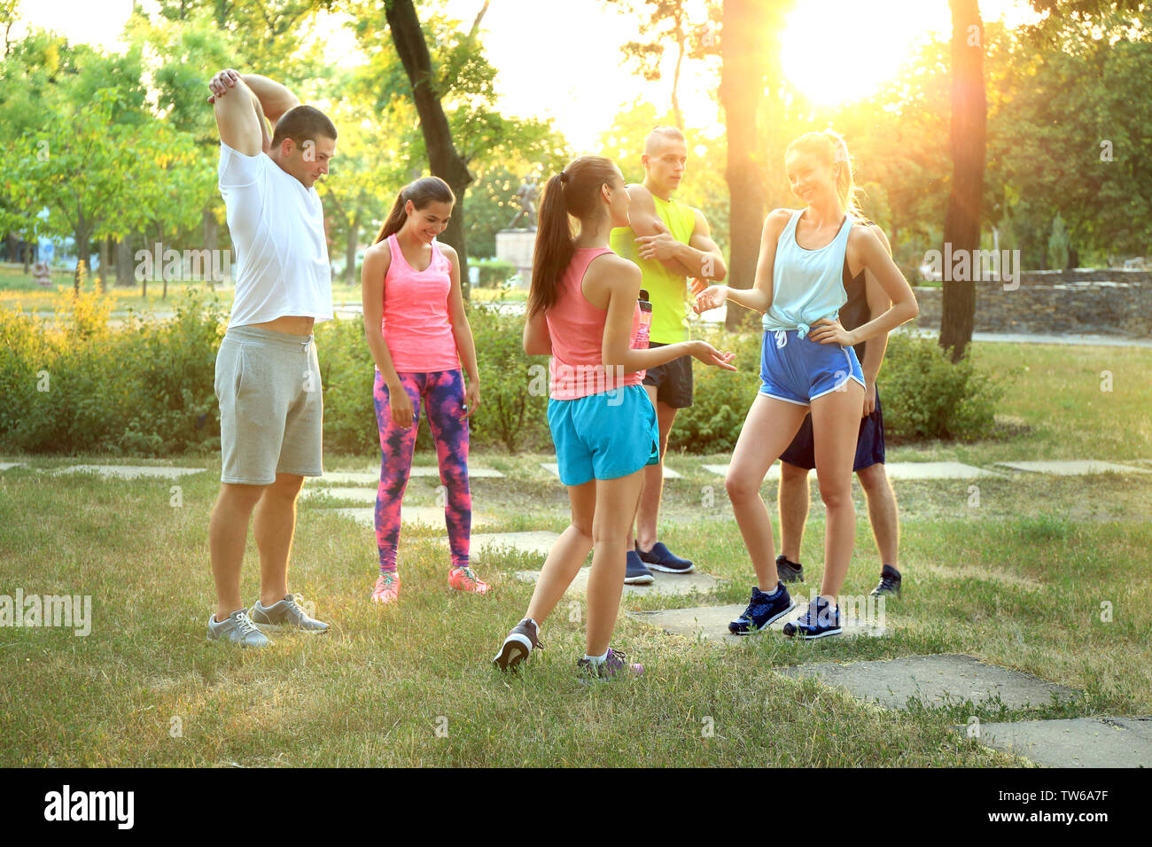 Group young sporty happy hi-res stock photography and images - Alamy
