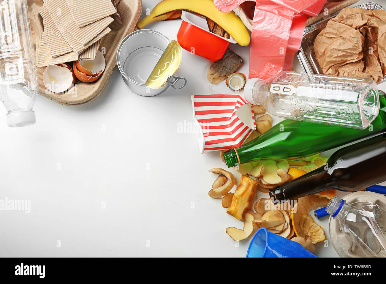 Composition with garbage on white background Stock Photo - Alamy
