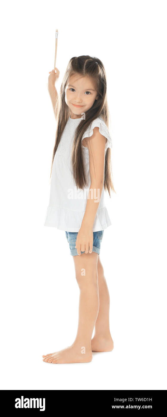 Little cute girl with brush on white background Stock Photo - Alamy