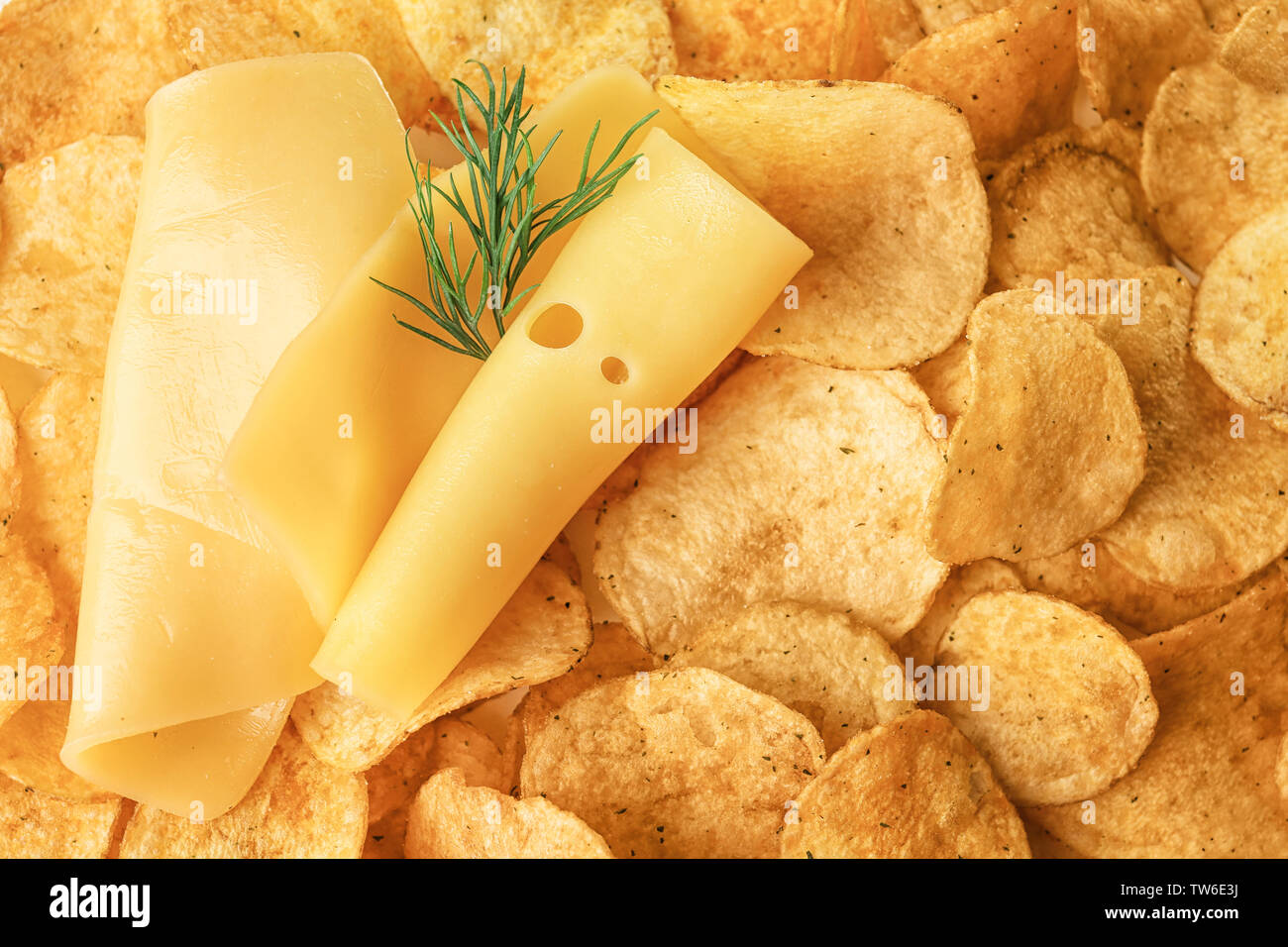 Potato chips with cheese as background Stock Photo Alamy