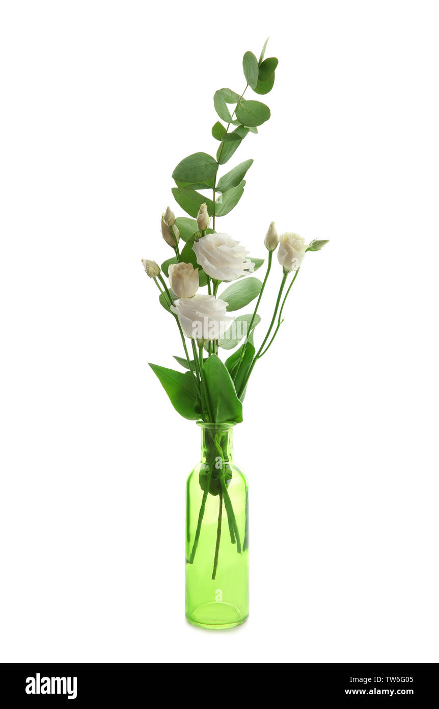 Vase with beautiful flowers on white background Stock Photo - Alamy