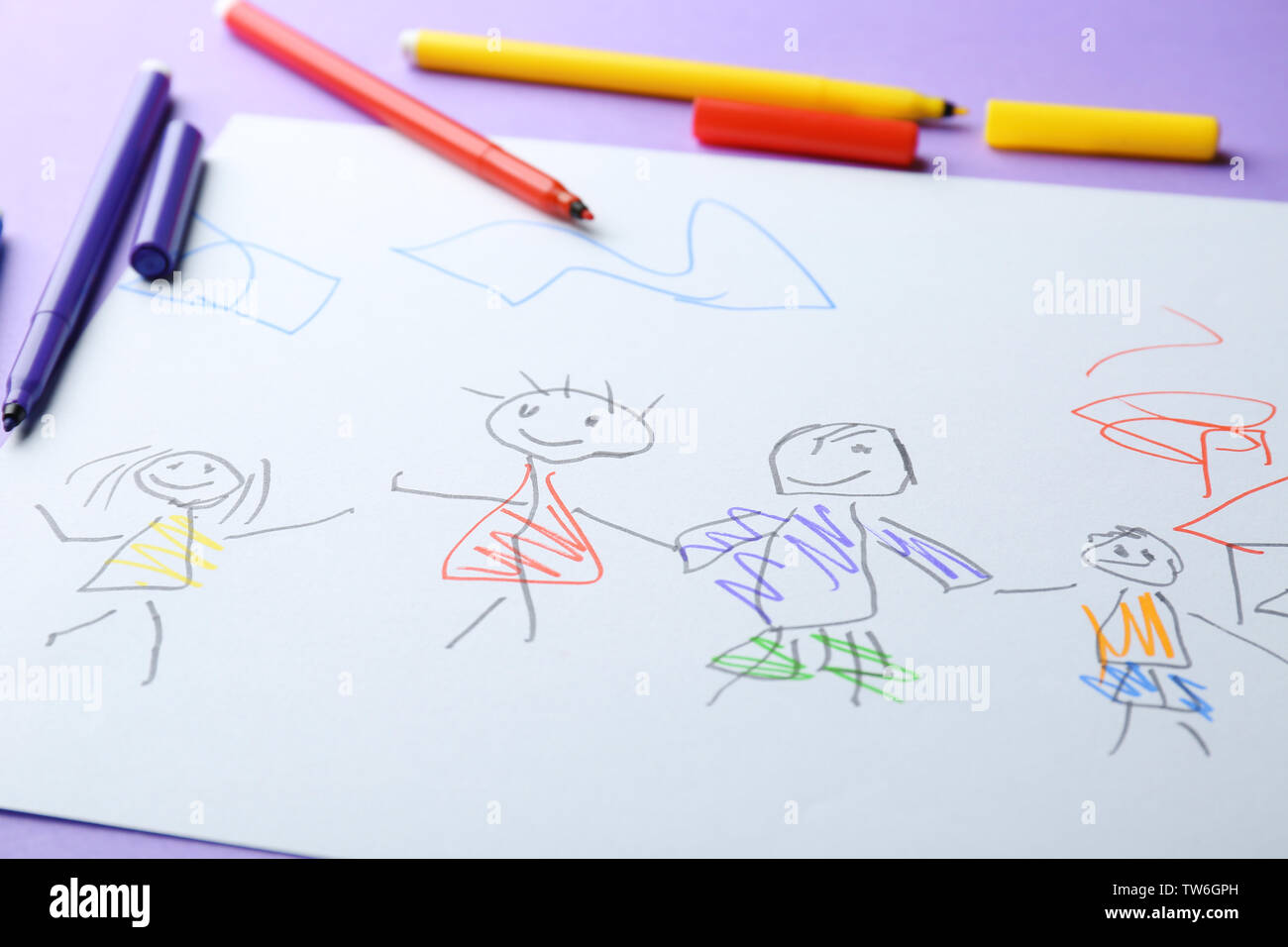 Mother father son drawing markers hi-res stock photography and images ...