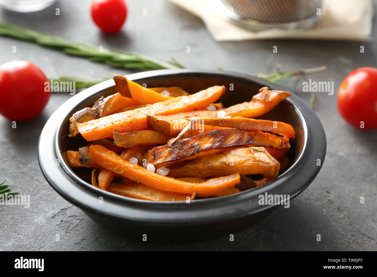 Sweet potato fries on table Stock Photo