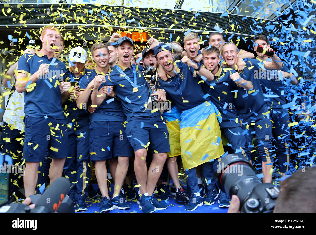 KYIV, UKRAINE - JUNE 16, 2019: Ukraine U20 national football team pose for a group photo with trophy upon arrival in Kyiv. Ukrainian national team won Stock Photo