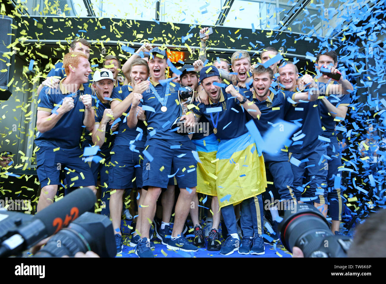 KYIV, UKRAINE - JUNE 16, 2019: Ukraine U20 national football team pose for a group photo with trophy upon arrival in Kyiv. Ukrainian national team won Stock Photo