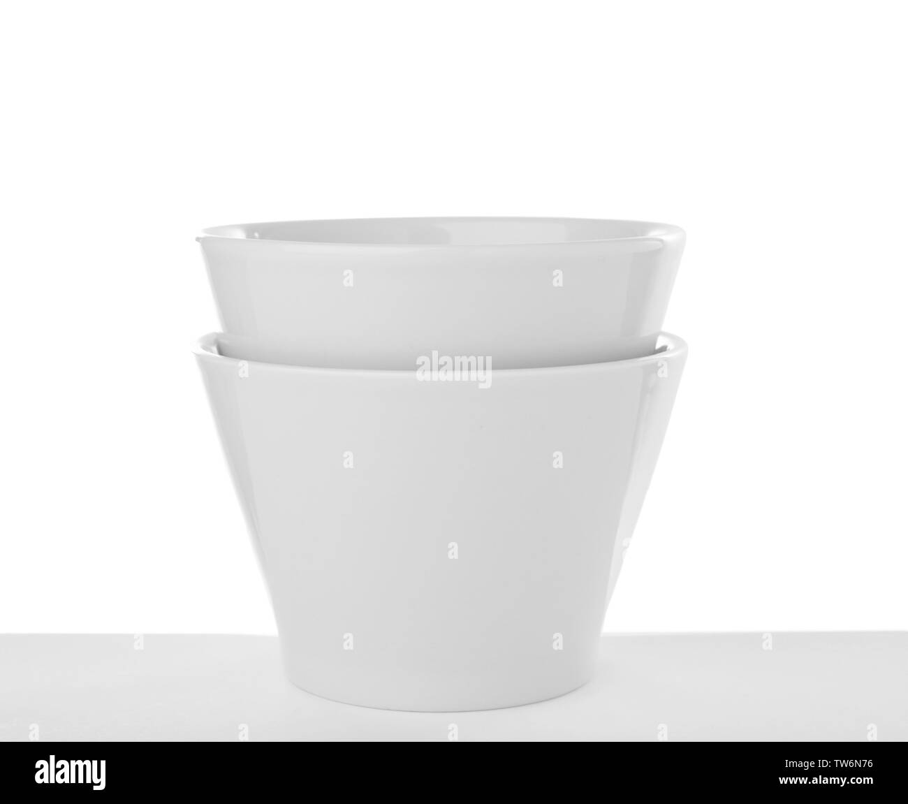 Ceramic bowls on white background Stock Photo - Alamy