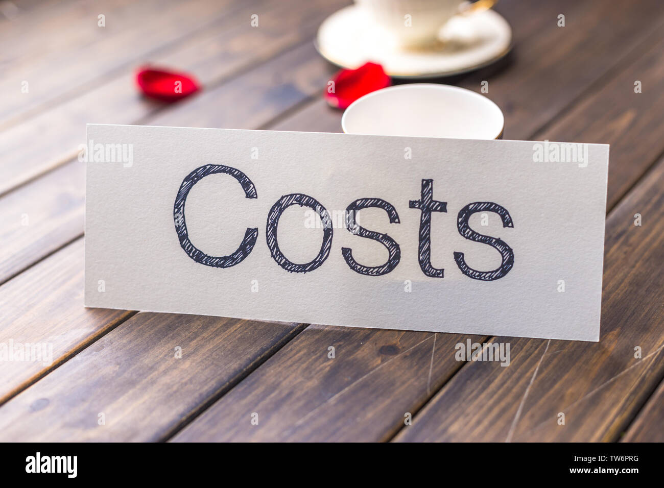 Cost on white paper in cafe Stock Photo