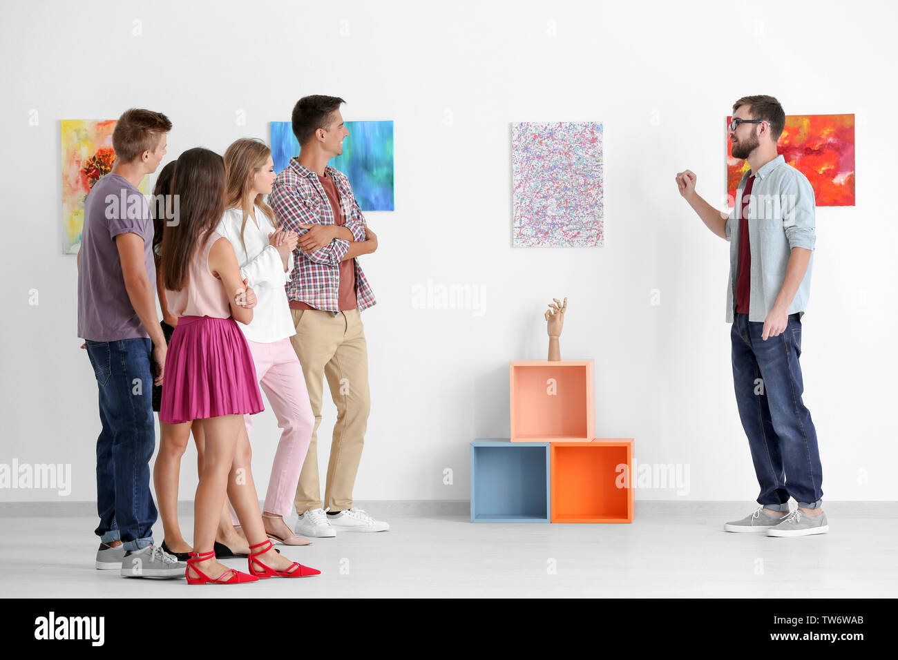 Group of people in art gallery Stock Photo - Alamy