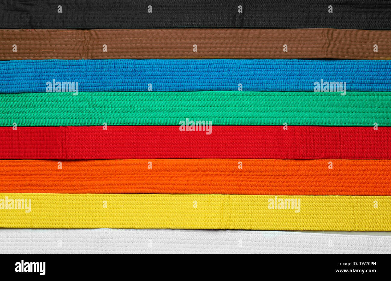 Colorful karate belts, top view Stock Photo Alamy