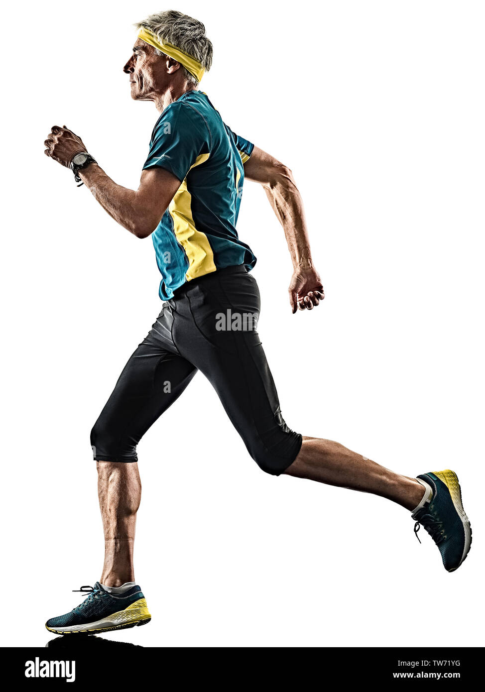 one caucasian senior man running runner jogger jogging  in studio shadow silhouette isolated on white background Stock Photo