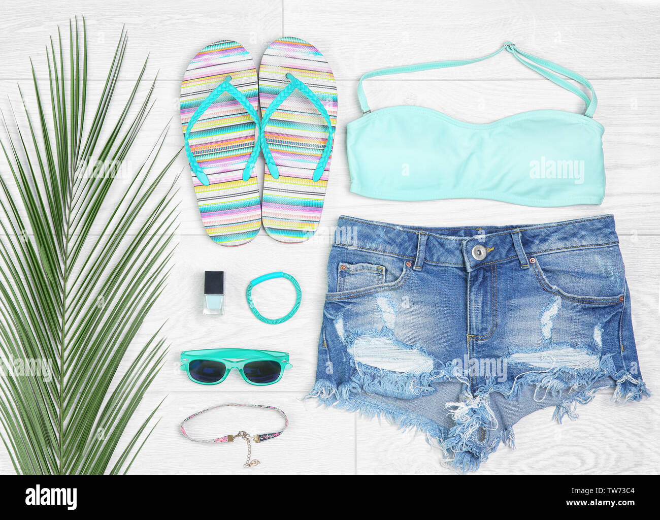 Composition with mint clothes and accessories on light background Stock Photo