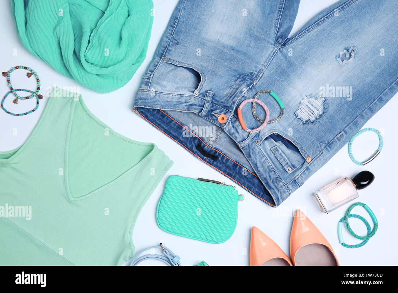 Composition with mint clothes and accessories on light background Stock Photo