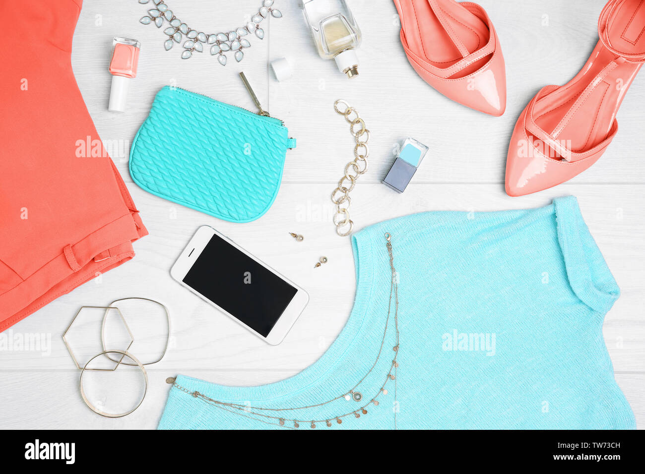 Composition with mint clothes and accessories on light background Stock Photo