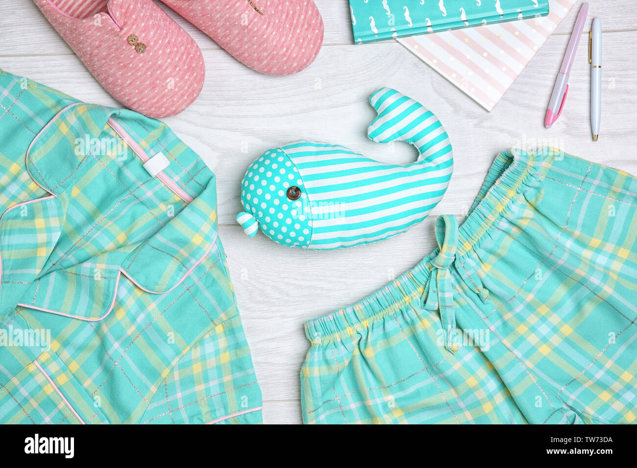 Composition with mint clothes and accessories on light background Stock Photo
