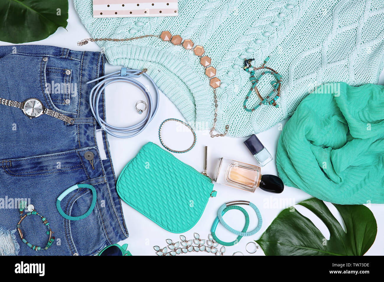 Composition with clothes and accessories on white background Stock Photo