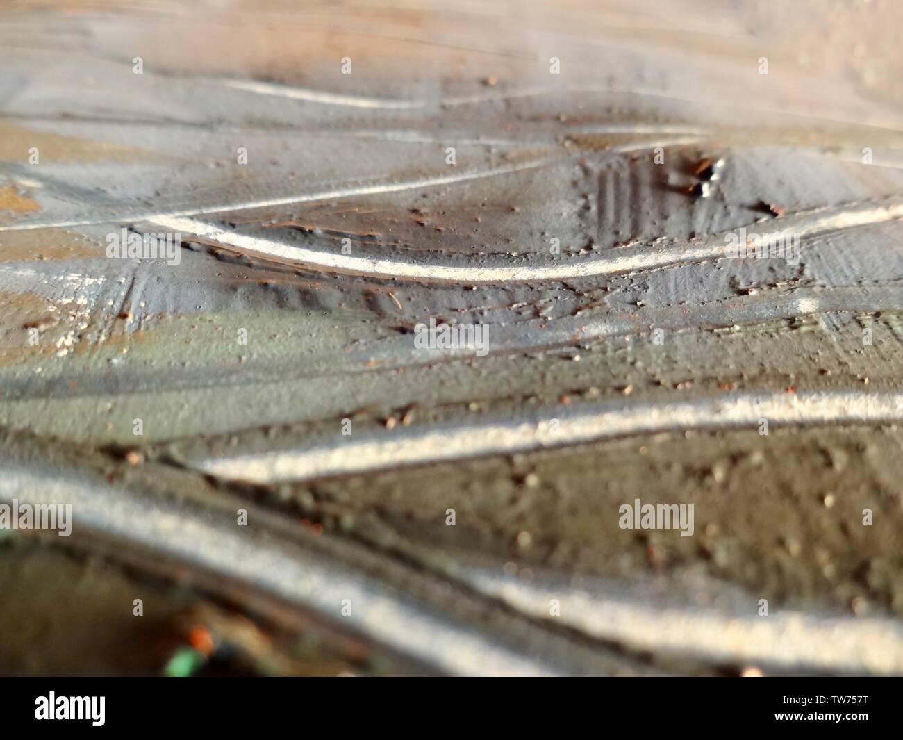 Light blue gold painting texture, creating flowing lines on the ...