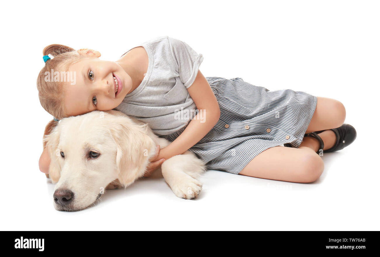Cute little girl with dog on white background Stock Photo - Alamy