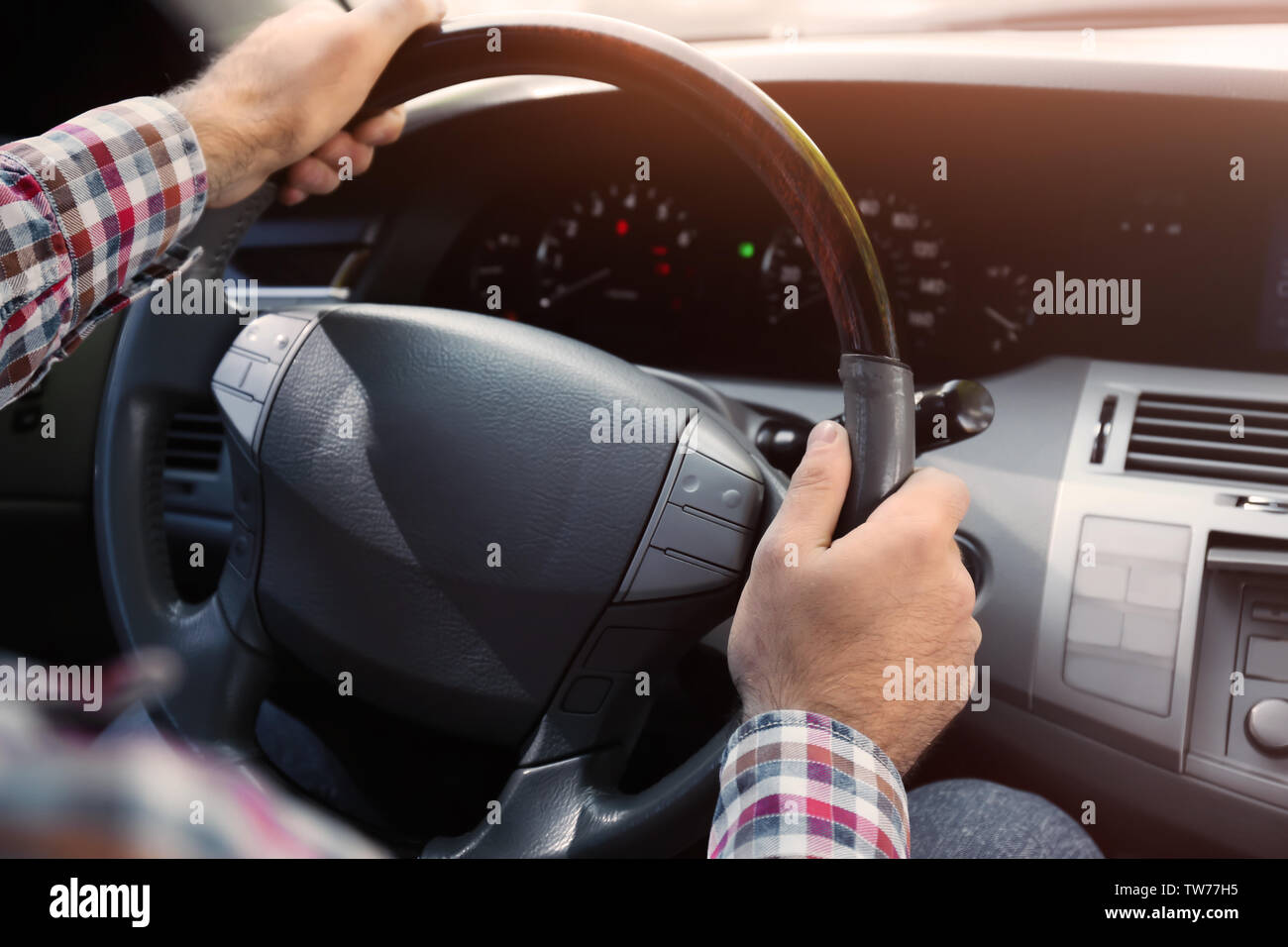 Holding hands on steering wheel hi-res stock photography and images - Alamy