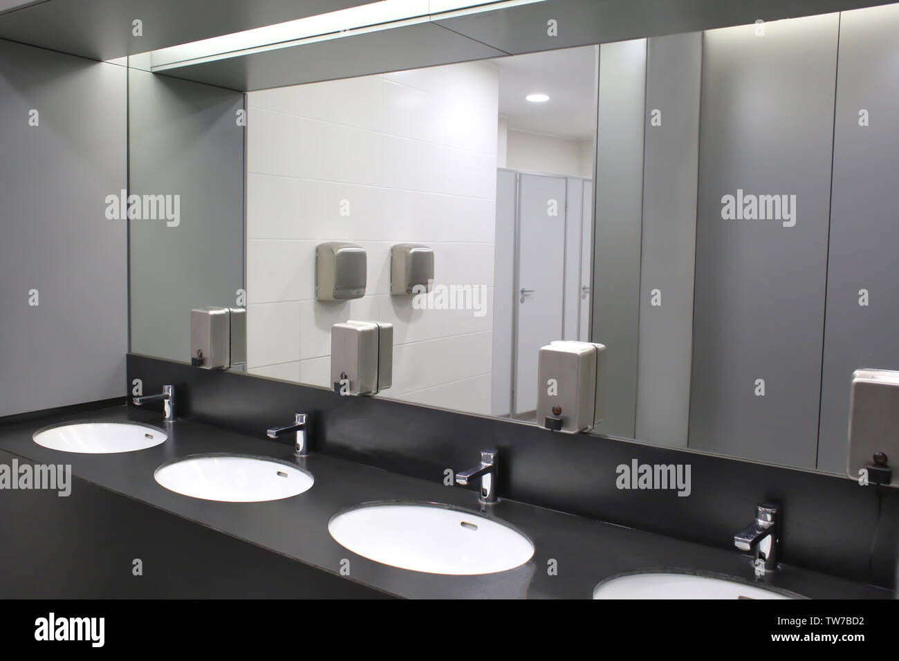 Public bathroom mirror hi-res stock photography and images - Alamy