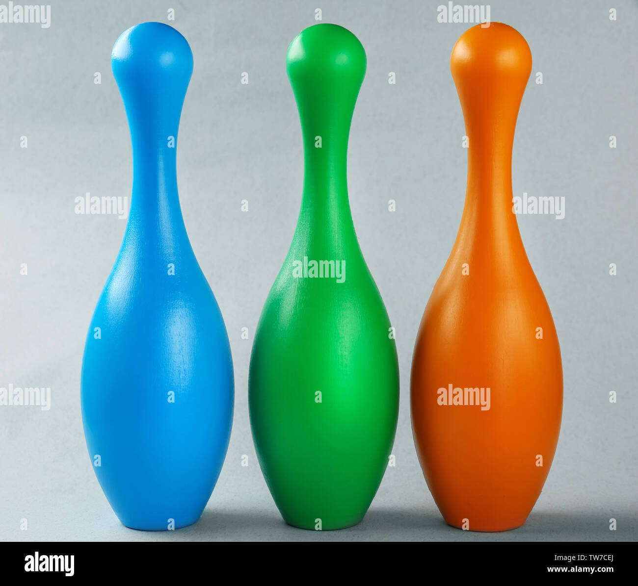 Bright bowling pins on light background Stock Photo