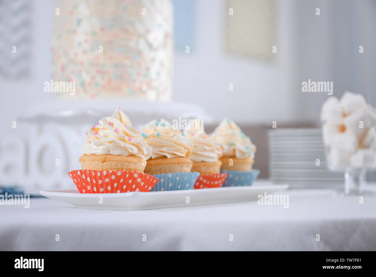 Delicious cupcakes on table, closeup Stock Photo