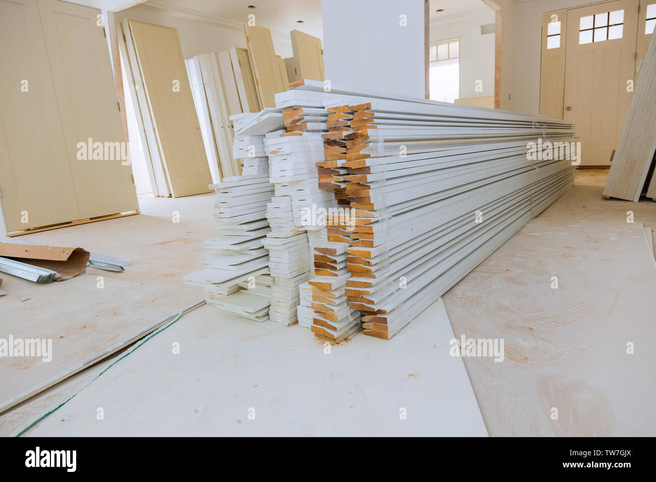 Interior construction of housing with drywall installed door for a new