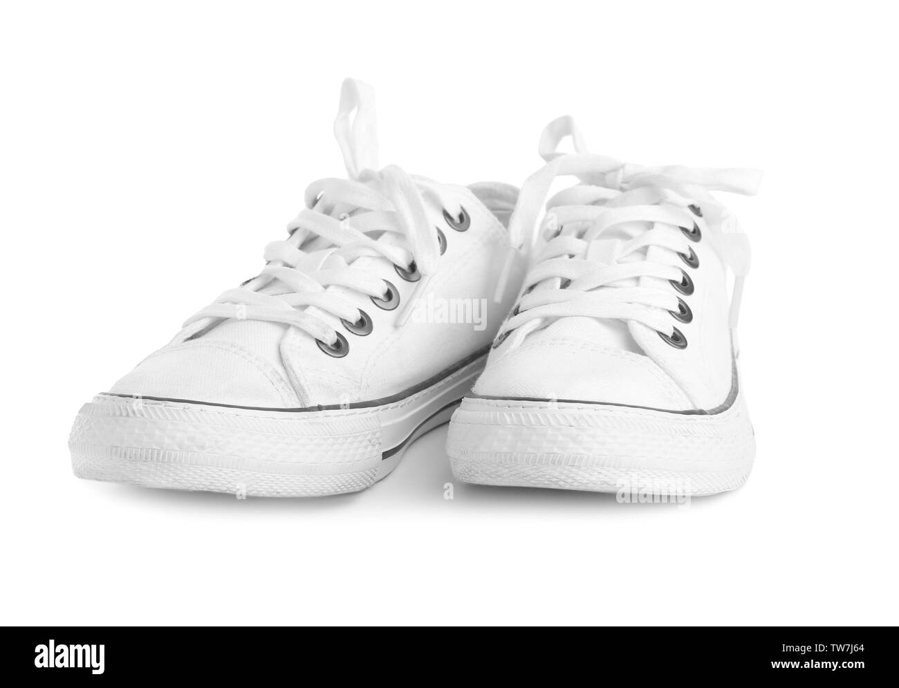Pair of tennis shoes, isolated on white Stock Photo - Alamy